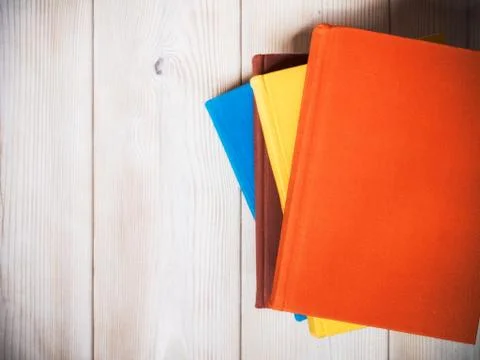 Books standing on the table Stock Photos