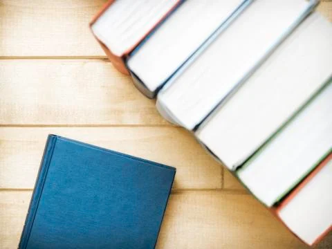 Books standing on the table Stock Photos