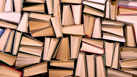 Books on the table, spines up. Stockbeeldmateriaal 171928788