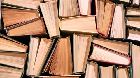 Books on the table, spines up Video stock 171932165