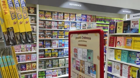 Bookshelves Displaying Various Educational Video stock 309841023