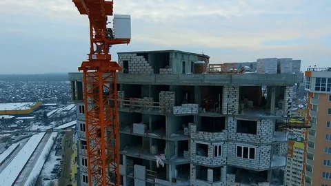 Boom crane at the top of a skyscraper Stock Footage 87248604
