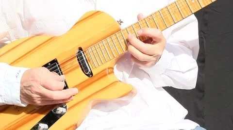 Boomer playing electric guitar Stock Footage