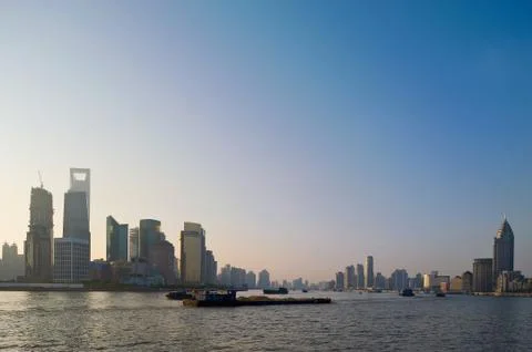 The booming skyline of shanghai's pudong rises behind the huangpu river Stock Photos