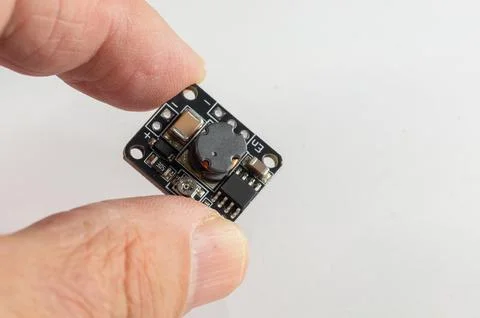 Boost Module High Voltage DC-DC Step Up Converter for DIY Ion Generator in ha Stock Photos