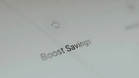 Boost Savings function with a piggy bank icon from a money manager application 스톡 동영상 330258939