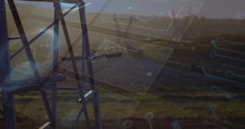 On boot faint UI panels shifting and rotating over tower revealing code, mapping Stock Footage 327524914