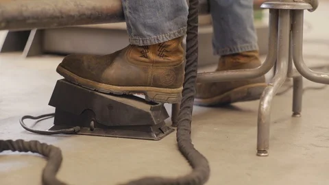 Boot on feed pedal for TIG Welding Stock Footage 103339179