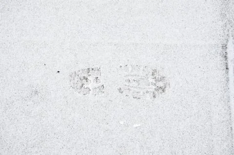 Boot footprint in the snow Foto stock