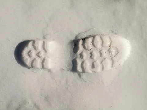 Boot footstep on snow Foto stock