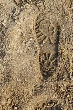 Boot print on the sand Stock Photos