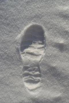Bootprint in the Snow. Stock Photos