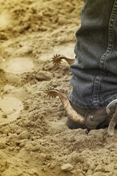 Boots and spurs Stock Photos