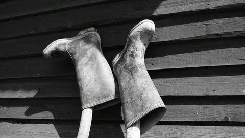 Boots are drying, black and white Stock Footage 116023954