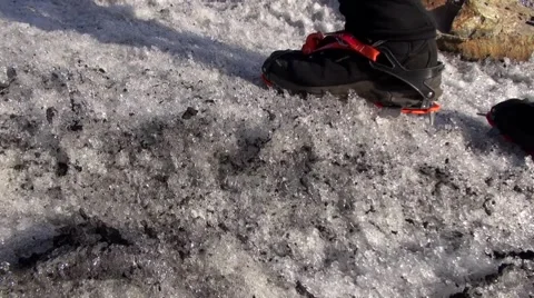 Boots with crampons. Man climbs the ice Stock Footage 44333087