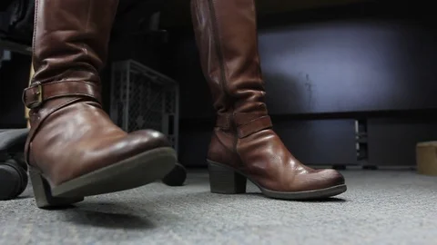 Boots following beat Stock Footage 77052898
