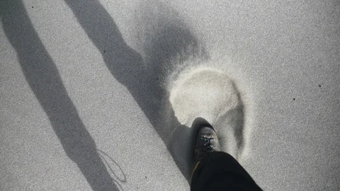 Boots Impacting Through Sand Making Wake of Sand in Sand Dunes National Park Stock-Footage 106072198