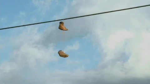 Boots on powerline Stock Footage 309623