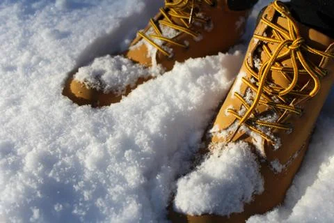 Boots in the snow Stock Photos