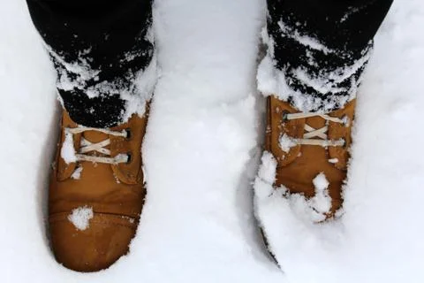Boots in the snow. Stock Photos