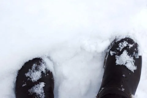 Boots in the snow Stock Photos