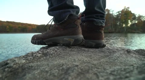 Boots Standing on Rock Video stock 69071026