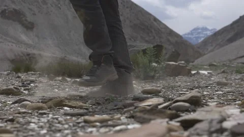 Boots walking on rocks Stock Footage 141788151