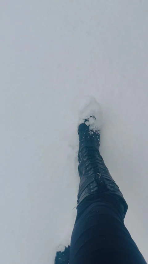 Boots Walking Through Snow with Crunching Sound | Winter Footsteps Stock Footage 322198661