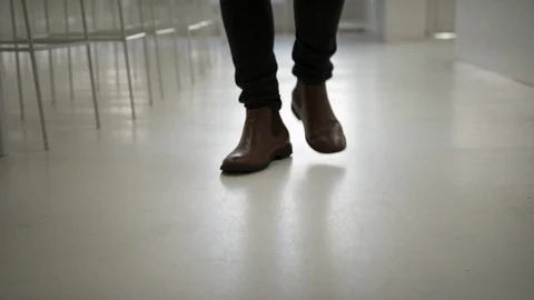 Boots Walking towards camera Stock Footage 123683379