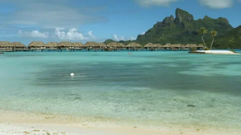 Bora Bora, French Polynesia. Panoramic View of Beach, People and Bungalows of Vídeos de archivo 340506027