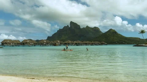 Bora Bora, French Polynesia. People in Shallow Lagoon Water, Beach and Vídeos de archivo 340505963
