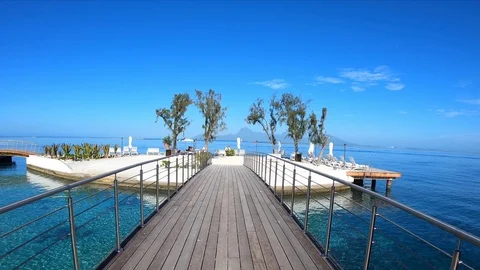 Bora Bora wood bridge Pier Open Water on the sea TimeLapse Hyperlapse Stock Footage 101689544