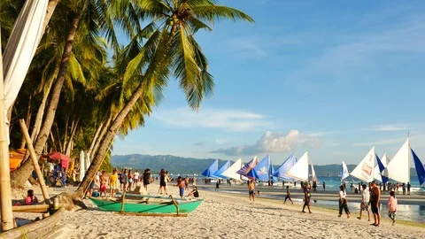 Boracay, April 9, 2017: UHD evening view of White Sand beach in Boracay island. Stockbeeldmateriaal 77016148