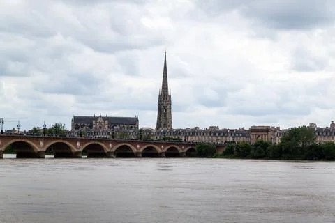 Bordeaux seen from the other side of the river in a cloudy day Stock Photos