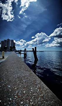 Border between ocean and civilization Stock Photos