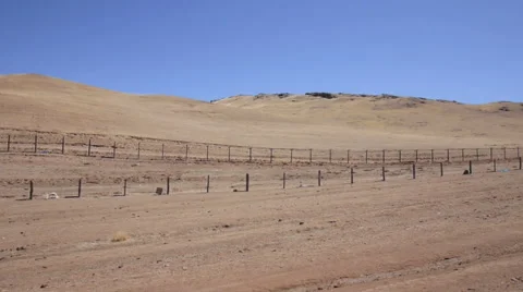 Border between states. driving along poles in steppe Stock Footage 50253660