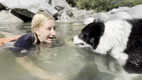 Border Collie Making Bubbles With His Owner, Instagna, Ticino, Switzerland - 09  Stock Footage 315073439