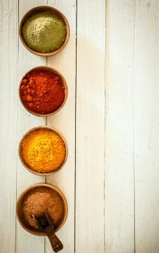 Border of colourful spices Stock Photos