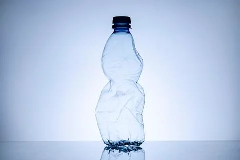 Border of a crumpled empty clear plastic bottle Stock Photos