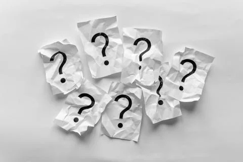 Border of crumpled question marks on cards Foto stock