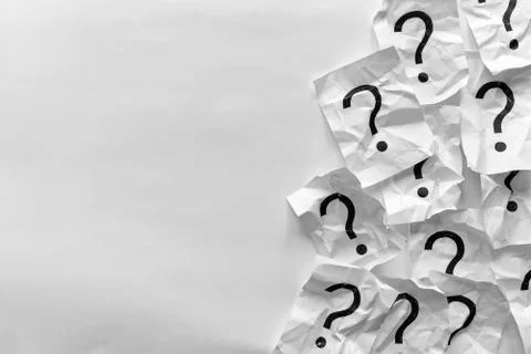 Border of crumpled question marks on cards Stock Photos