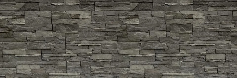 Border Facing tile stone wall texture background dark gray color Foto stock