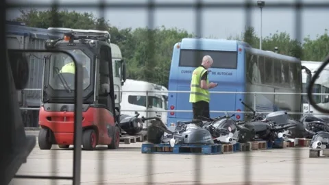Border Force warehouse near Dover houses scores of dinghies siezed from people  Stock Footage 315516630