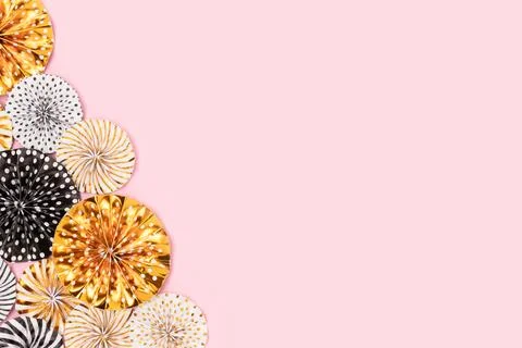 Border frame made of colorful paper fans. Stock Photos