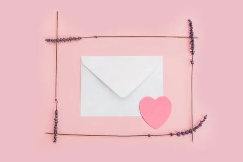 Border frame made of dried lavender flowers on a pink pastel background Stock Photos