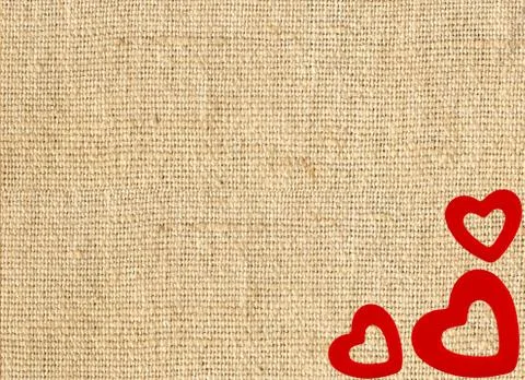 Border frame of red hearts on sack canvas burlap background texture Foto stock