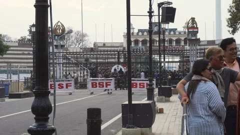 Border Gate at Pakistan to India Border With Spectators On Both Country Sides Stock Footage 129586703
