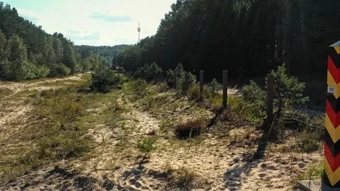 Border line between Poland and Germany, camera moving above. 動画素材 118453790