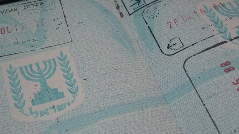 Border marks on the pages of Israeli foreign passport Stock Footage 103173438