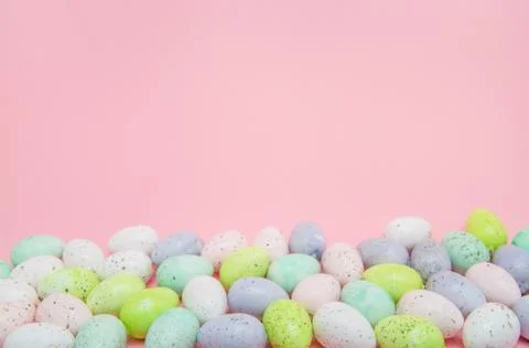 Border of pastel speckled easter eggs Stock Photos
